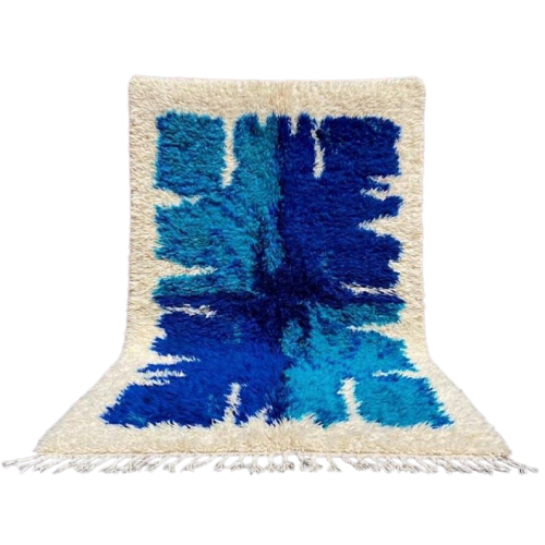 handmade-blue-abstract-moroccan-rug-main.jpg Handmade blue abstract Moroccan Berber wool rug on a white background